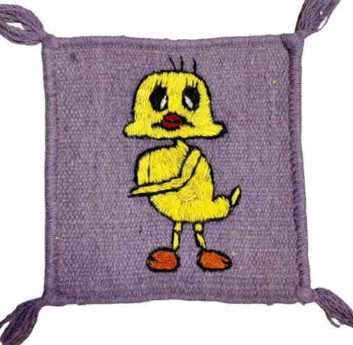 Purple bag with a yellow chick design on a white background