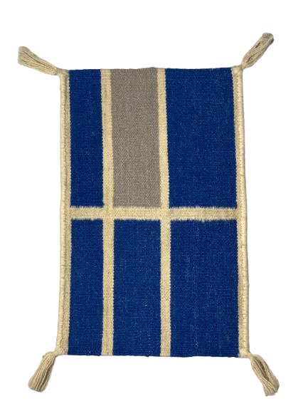 Woven fabric with blue and gray pattern on a white background