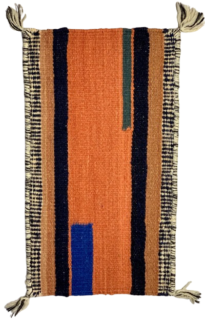 Woven textile with striped pattern in orange, black, and blue on a white background